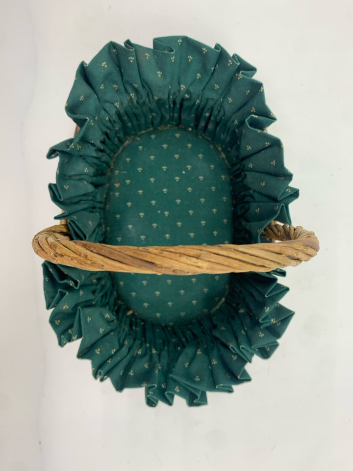 OVAL BASKET W/GREEN FABRIC LINER.