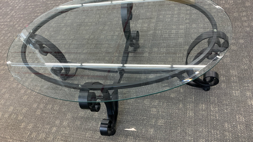 GLASS TOP METAL SCROLL COFFEE TABLE.