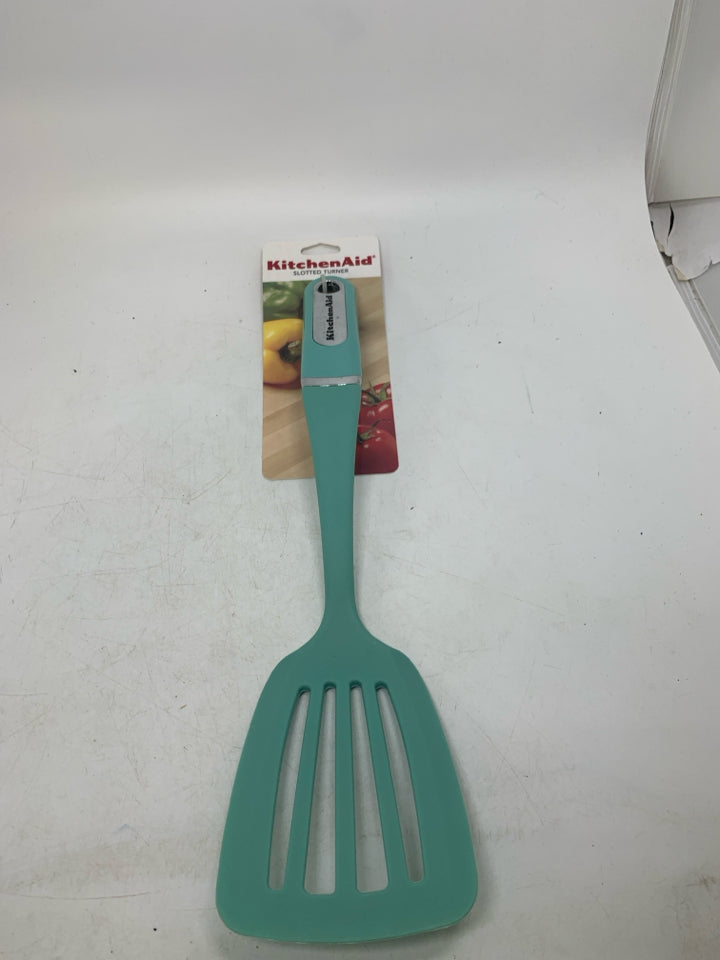 NIP SLOTTED SPATULA.
