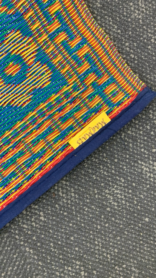 BLUE/ORANGE MAD MATS REVERSIBLE INDOOR OUTDOOR RUG.