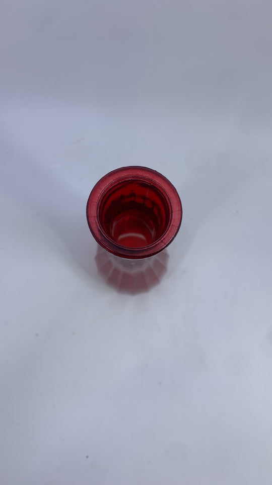 RED RIBBED GLASS BUD VASE.
