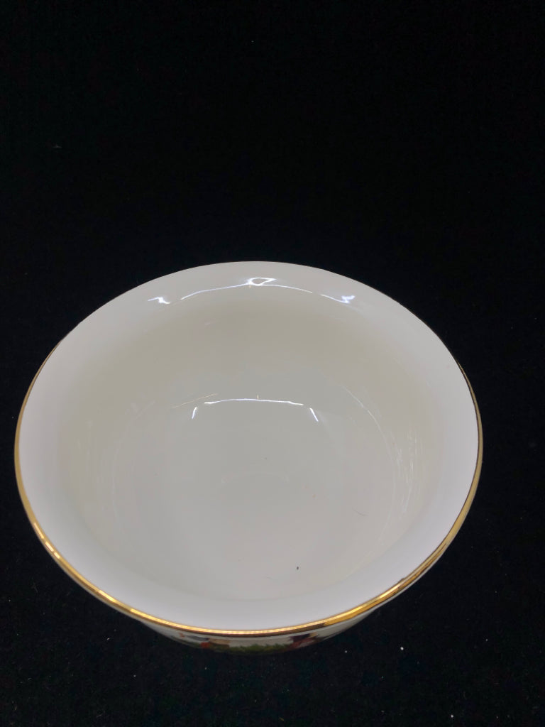 WHITE BOWL KIDS PLAYING WITH GOLD BOTTOM.