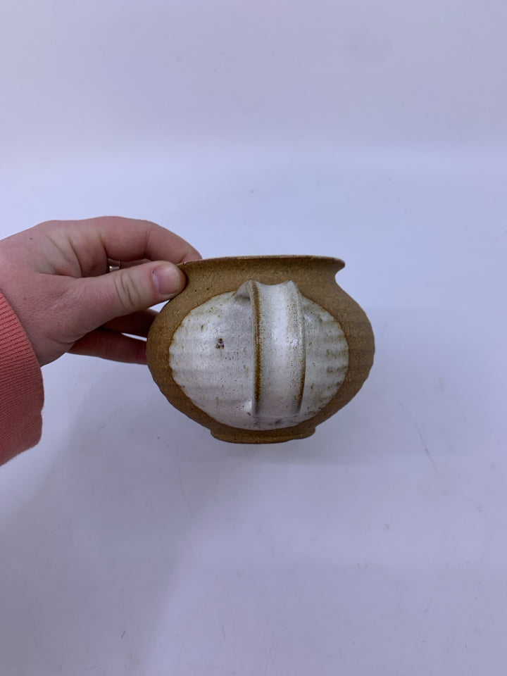 MATTE TAN CREAMER W/ WHITE SPECKLED SIDE/INSIDE POTTERY.