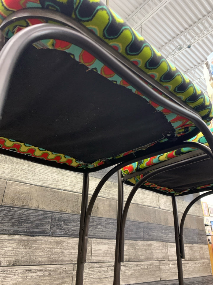 3 METAL SCROLL BAR STOOLS W/COLORFUL UPHOLSTERED SEAT.