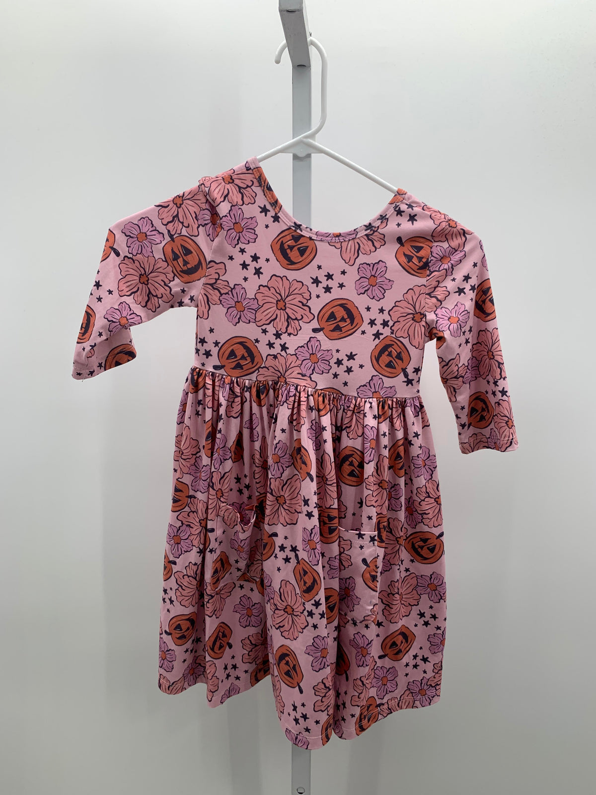 LONG SLV DRESS JACK O'LANTERNS FLOWERS.