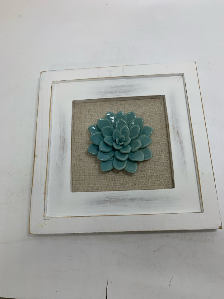 WHITE FRAME W/ CERAMIC SUCCULENT WALL HANGING.