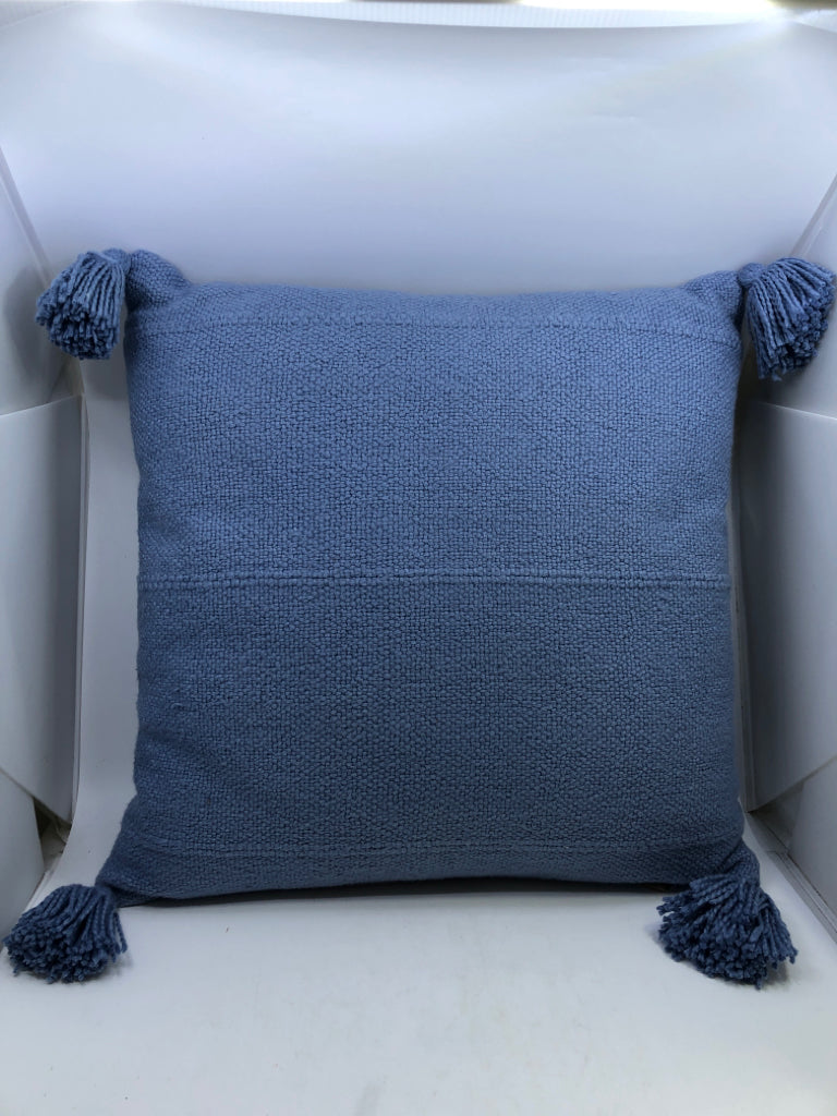 LT BLUE PILLOW W/TASSLES.