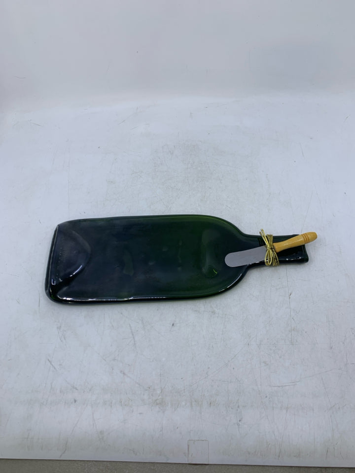 FLAT GREEN WINE BOTTLE W/ CHEESE SPREADER.
