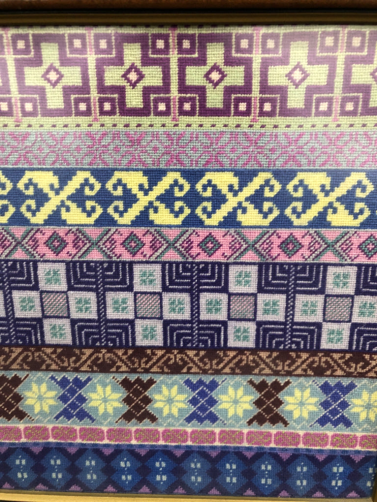 BLUE/PURPLE FRAMED NEEDLEPOINT.