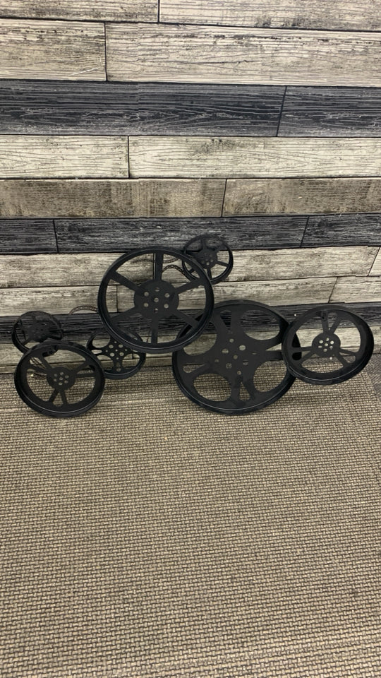 BRONZE DUSTED METAL FILM REEL WAL DECOR.