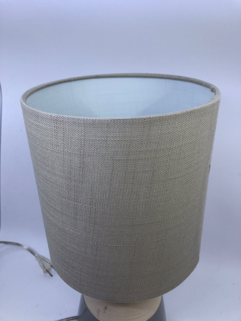 GREY/CREAM CERAMIC BASE LAMP W/TAN SHADE.