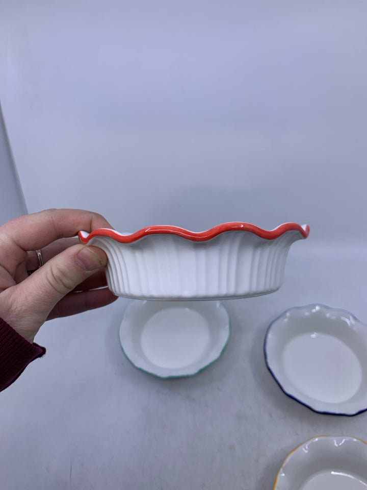 4 SINGLE PIE BAKERS W/ COLORED RIMS.