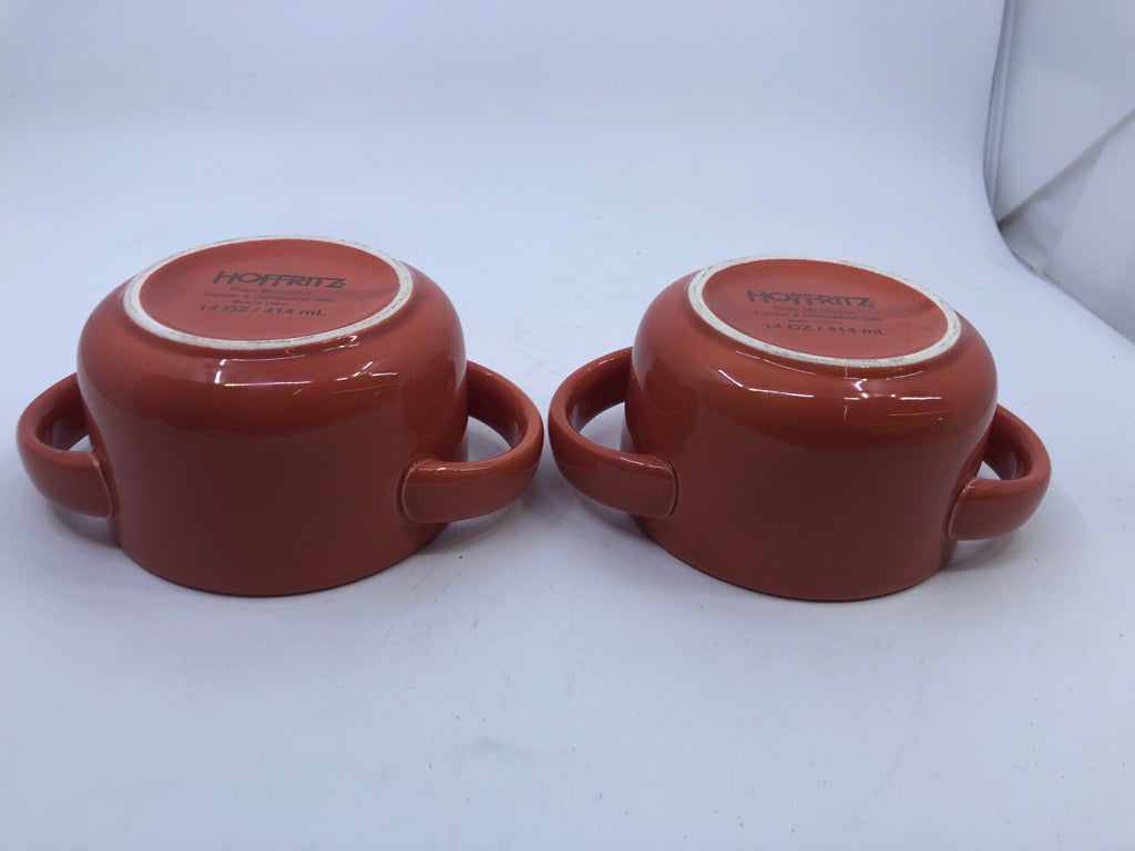 2 ORANGE BAKERS W HANDLES.