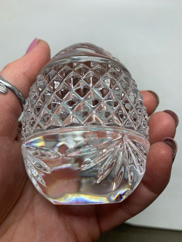 HEAVY GLASS TEXTURE EGG ON METAL STAND.