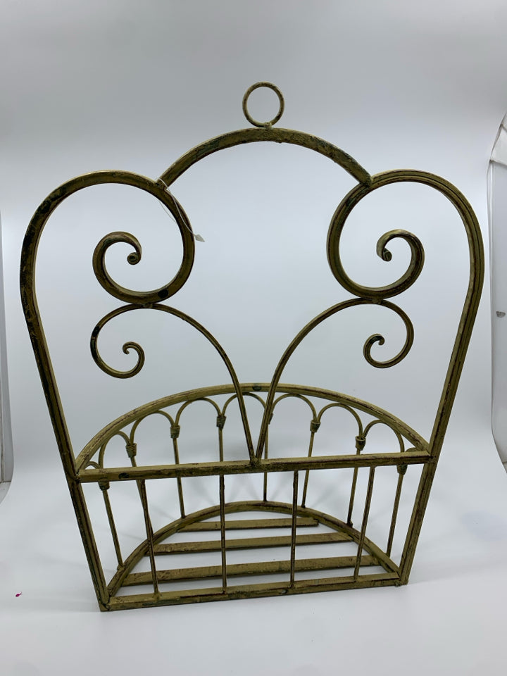 DISTRESSED YELLOW METAL SCROLL WALL POCKET.
