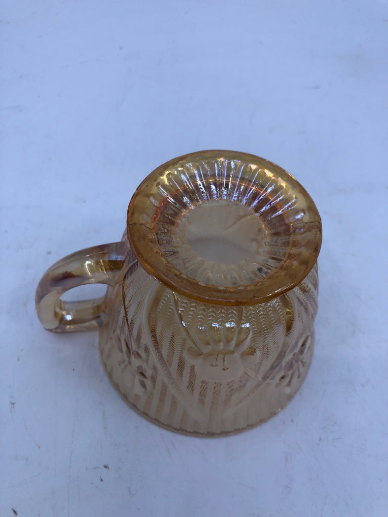 VTG CARNIVAL GLASS TEA CUP/SAUCER EMBOSSED FLOWERS.