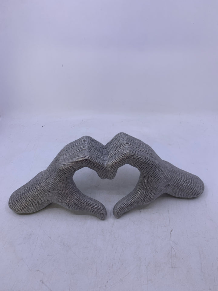 CERAMIC TEXTURED SILVER HANDS MAKING HEART SHAPED.