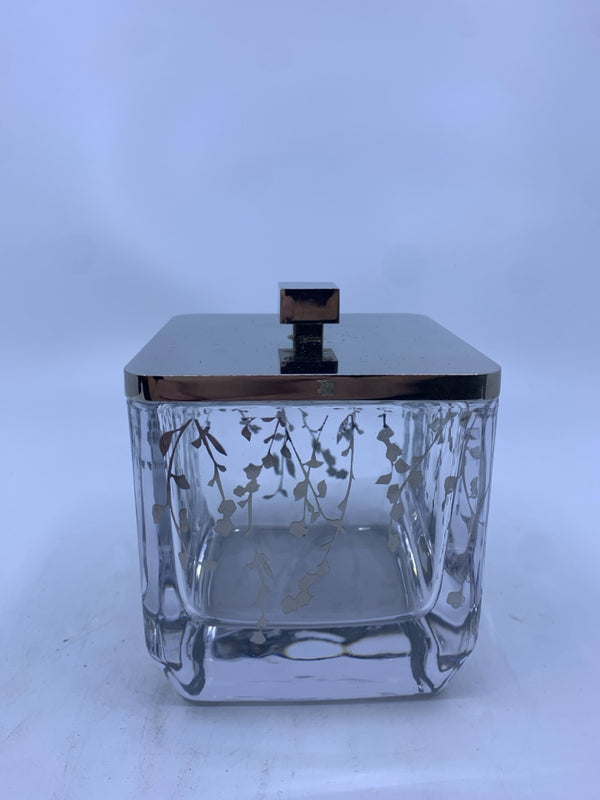 HEAVY GLASS CANISTER WITH SILVER TREE DETAIL AND SILVER LID.