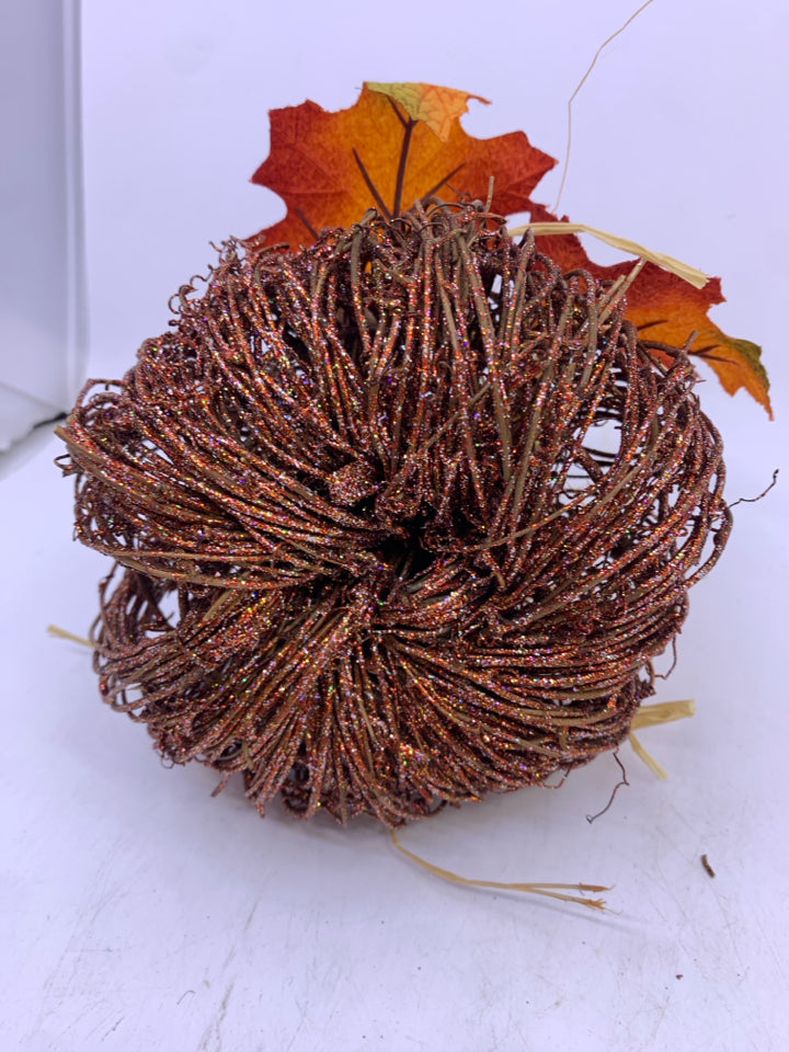 GLITTER TWIG PUMPKIN W/ PINECONES+LEAVES ON TOP.