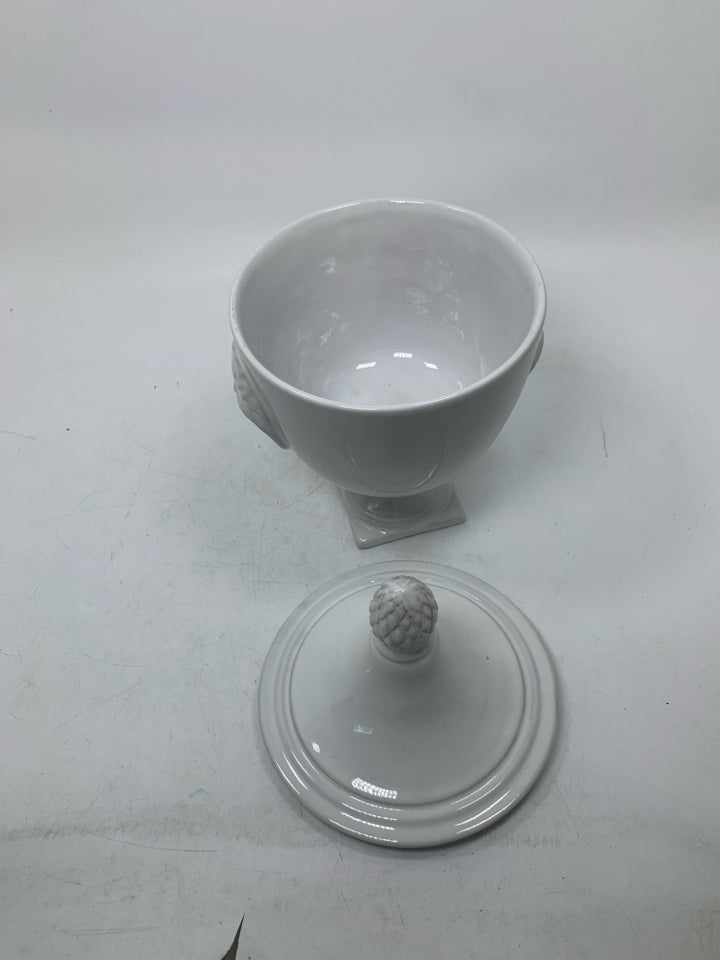 FOOTED URN SHAPED CANISTER W/ POINTED TOP.