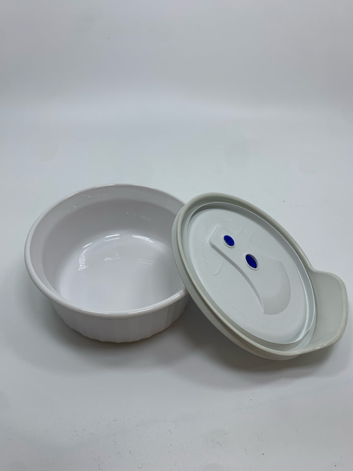 COVERED CORNING WARE DISH.