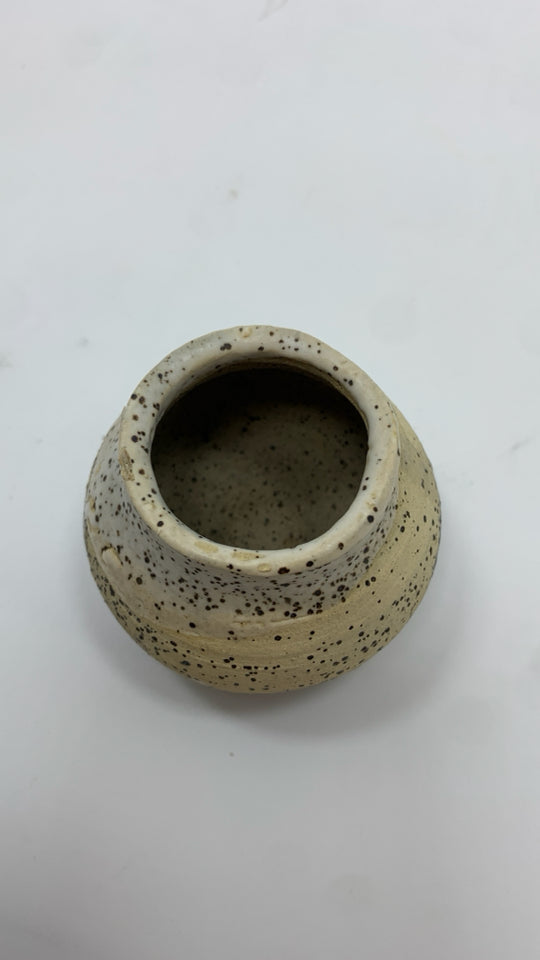 MINI CREAM W/BROWN SPECKLES POTTERY BUD VASE.