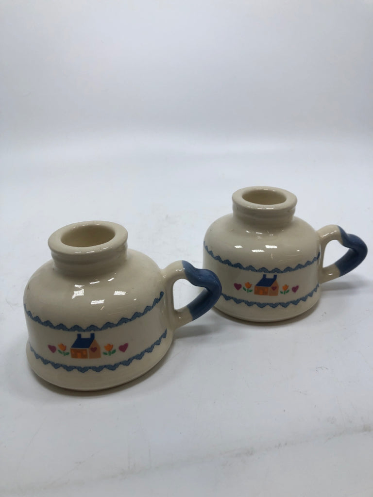 2 COUNTRY HOUSE CERAMIC CANDLE STICK HOLDERS.