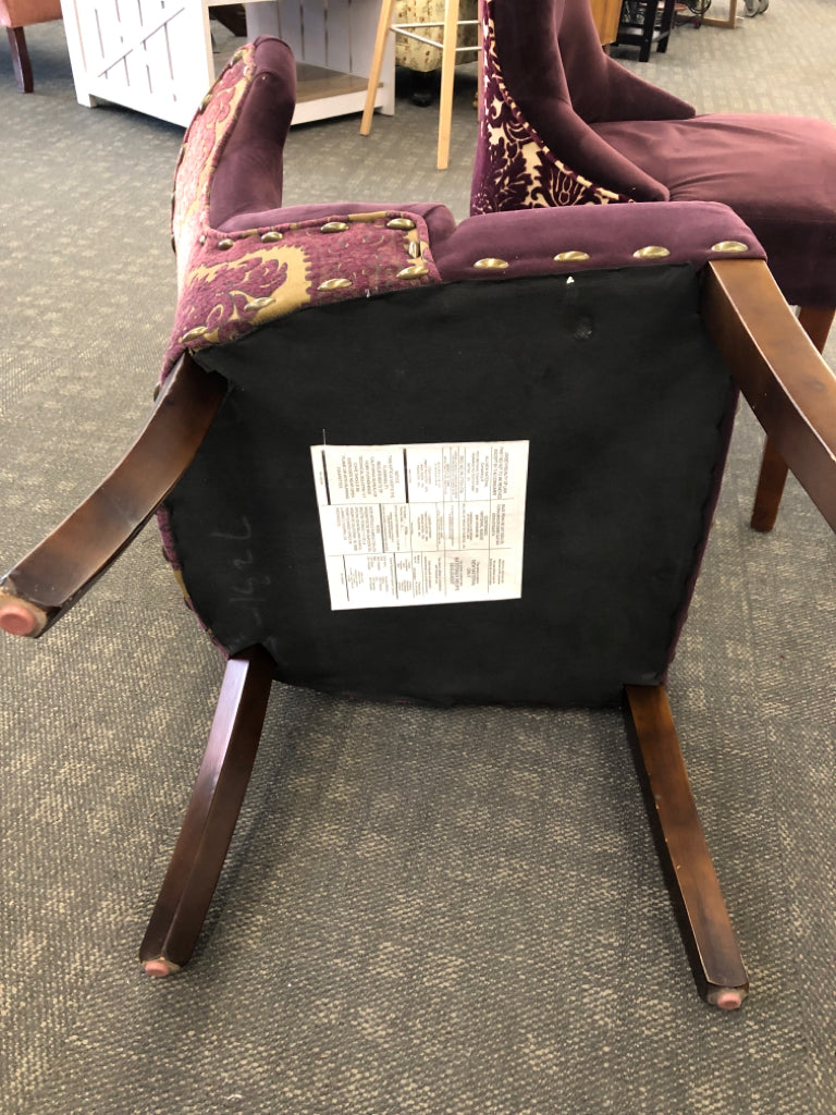 2 MAROON SUEDED CHAIRS W/PAISLEY DESIGN ON BACK & WOOD LEGS.