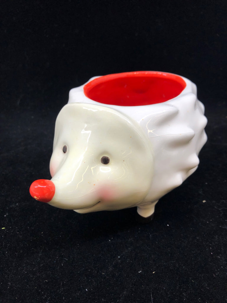 RED AND WHITE HEDGE HOG.