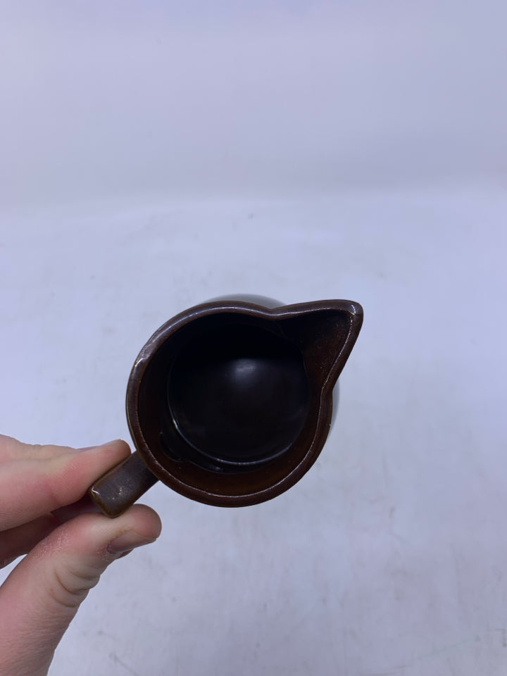 BROWN CERAMIC SMALL PITCHER.