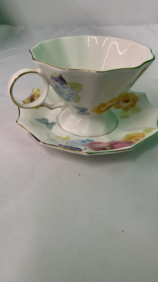 COLORFUL FLORAL TEACUP AND SAUCER.