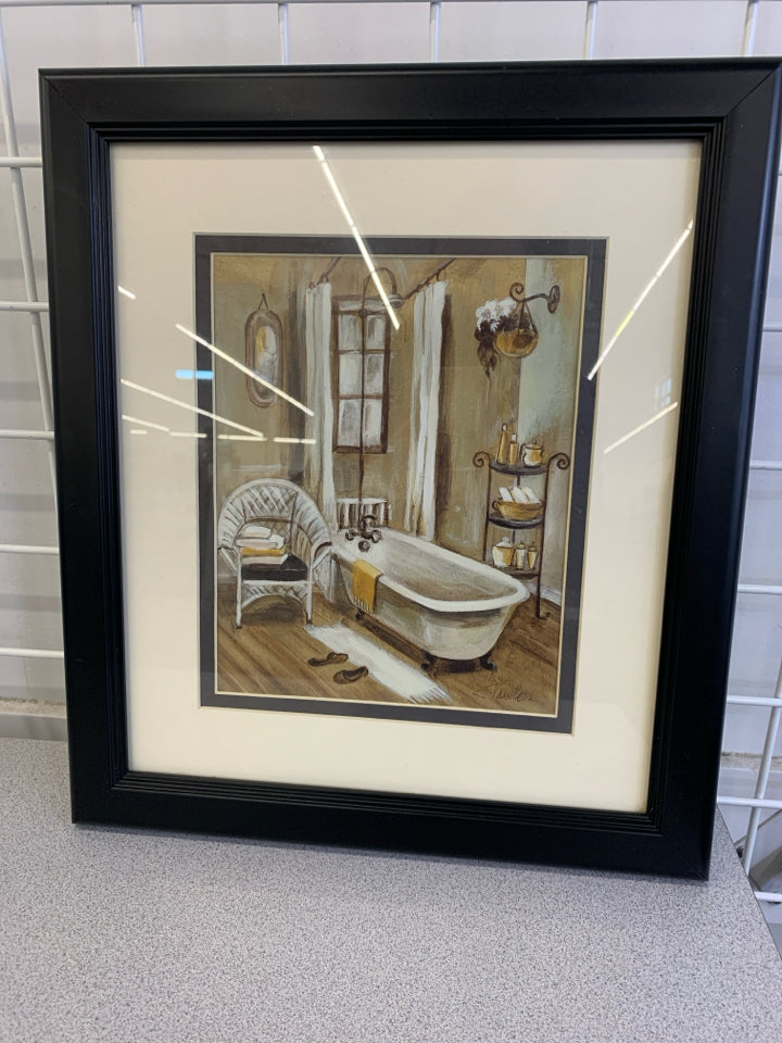 BATHTUB IN BATHROOM PICTURE W /BLACK FRAME.