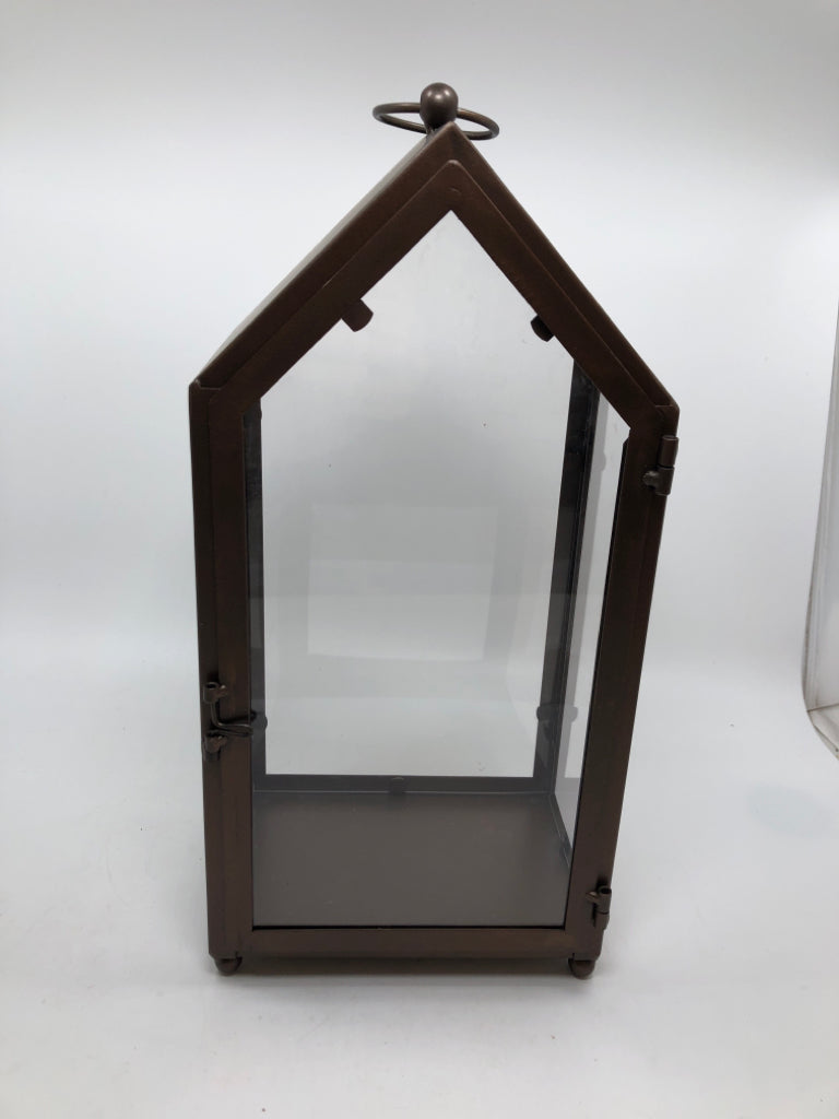 BRONZE PAINTED CANDLE LANTERN.