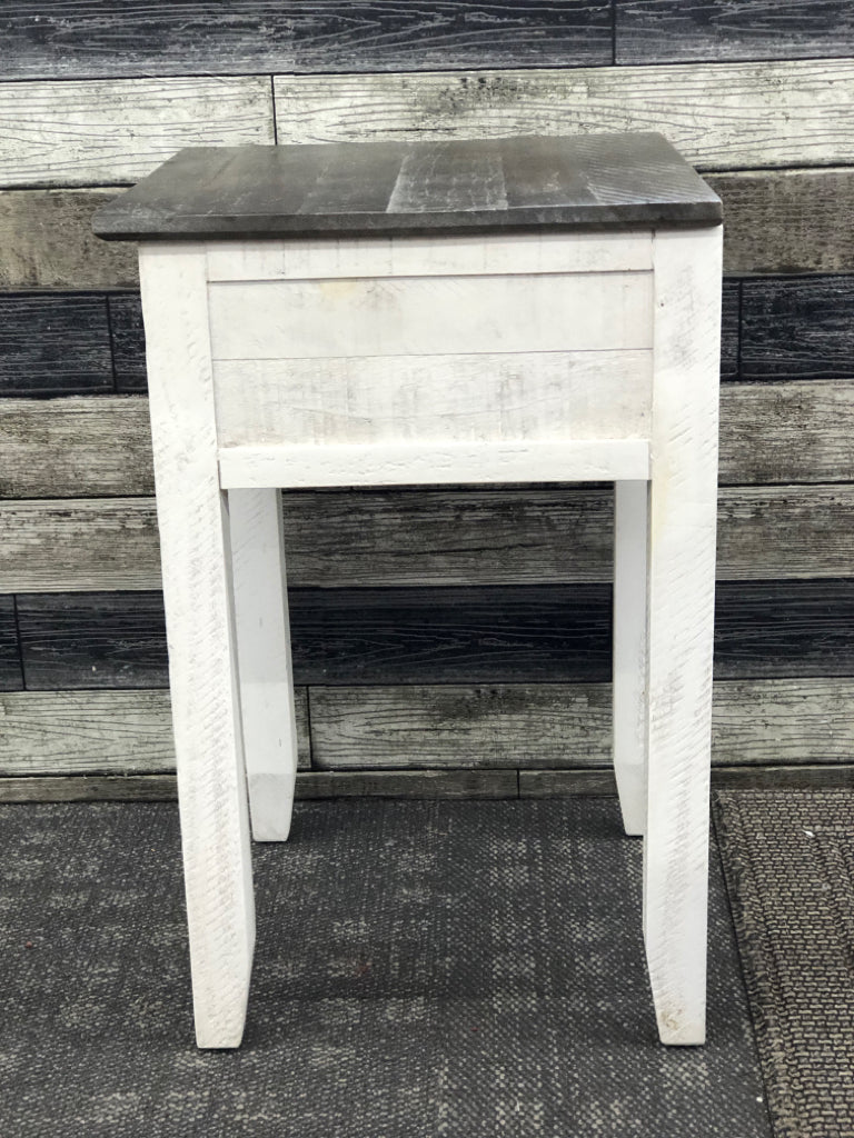SMALL WHITE SIDE TABLE W 1 DRAWER AND DARK WOOD TOP.