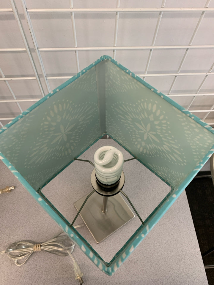 SILVER LAMP W/SQUARE TEAL SHADE.