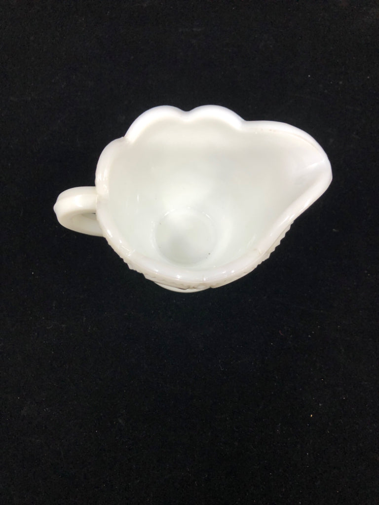 VTG MILK GLASS CREAMER W/CIRCLE PATTERN.