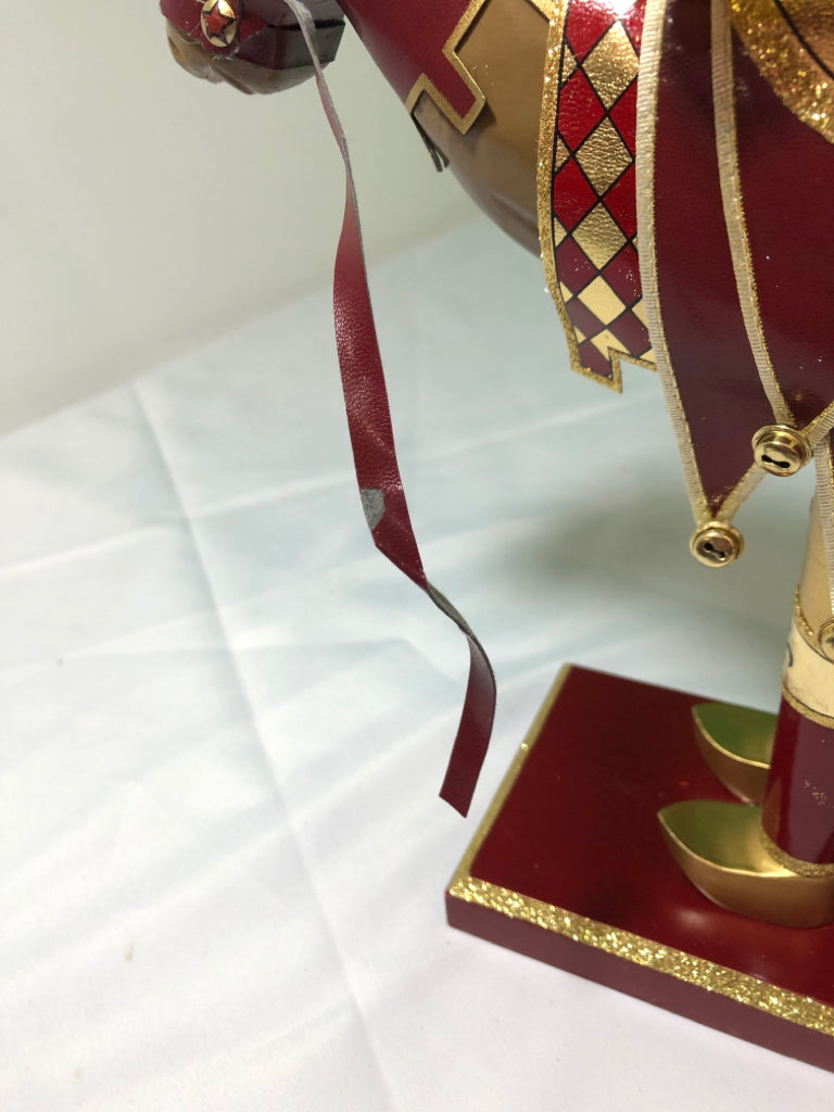 RED AND GOLD NUT CRACKER .