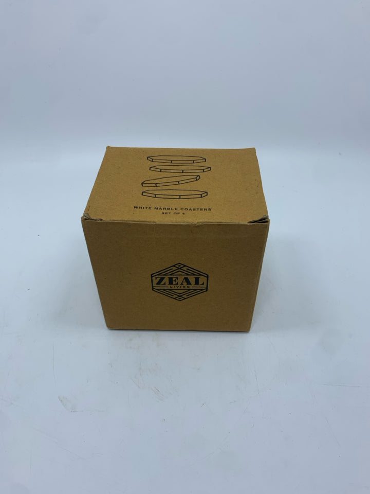 4 WHITE OCTAGON MARBLE COASTERS IN BOX.