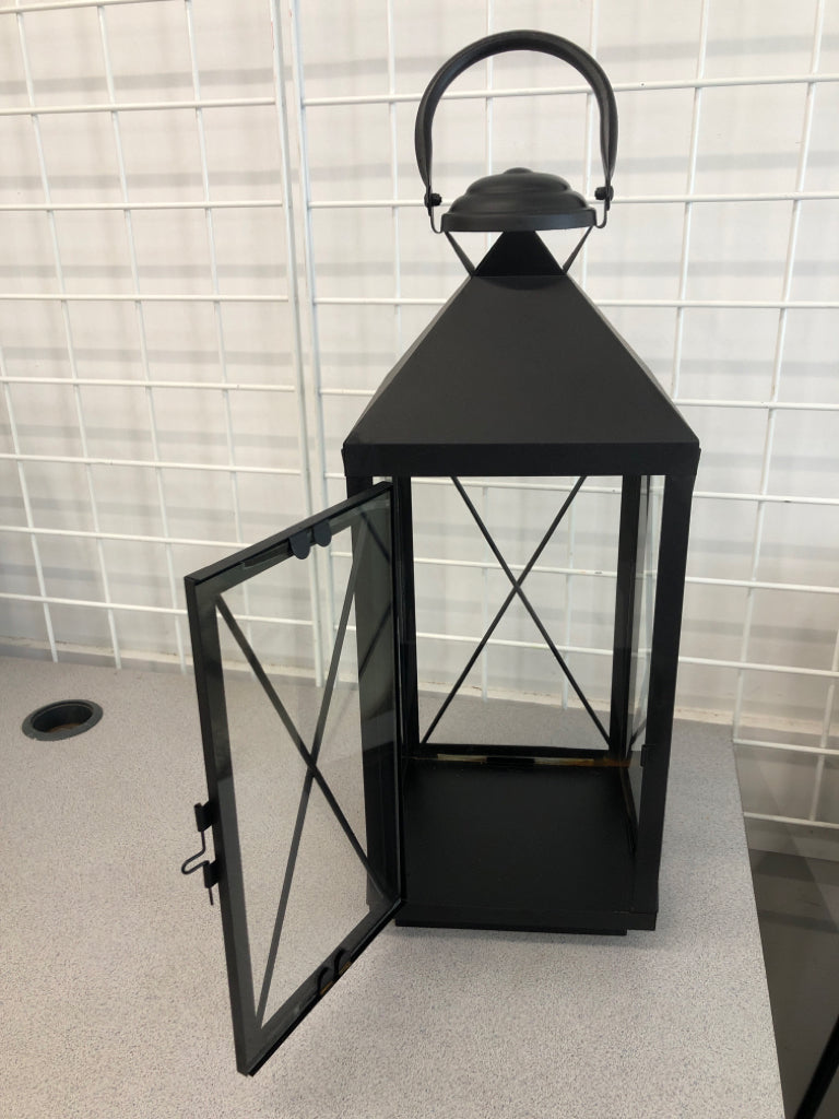 TALL BLACK CANDLE LANTERN.