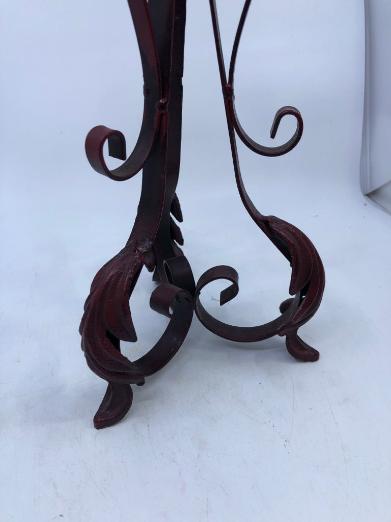 RED IRON SCROLL PILLAR CANDLE HOLDER.