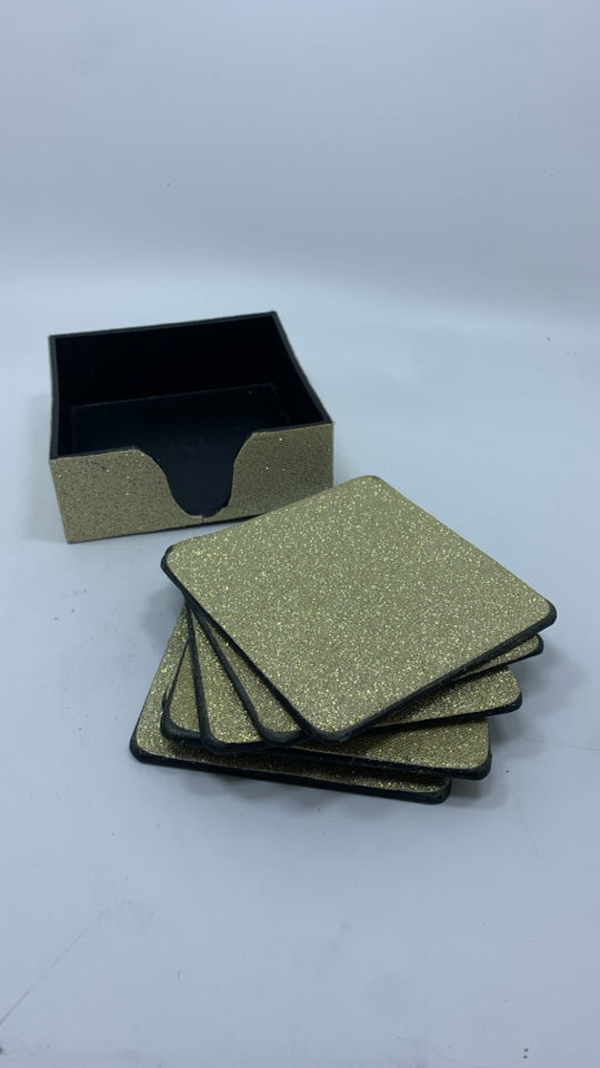 6PC GOLD GLITTER COASTERS W/HOLDING CASE.