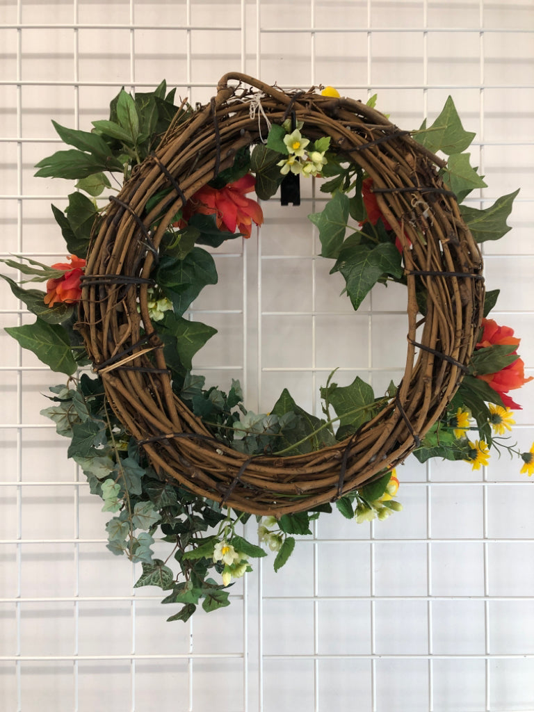 FAUX RED FLOWERS W/IVY WREATH.