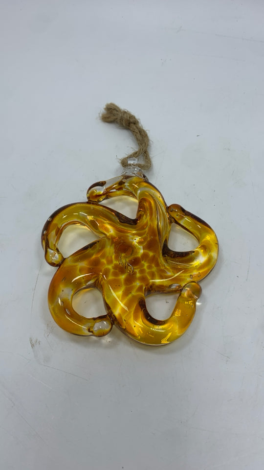 BLOWN GLASS STARFISH ORNAMENT.