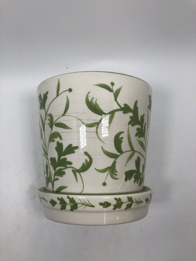 GREEN FLORAL PAINTED PLANTER.