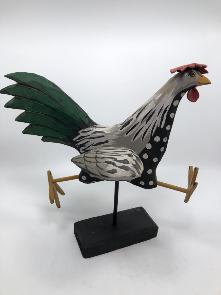 WOODEN ROOSTER RUNNING.