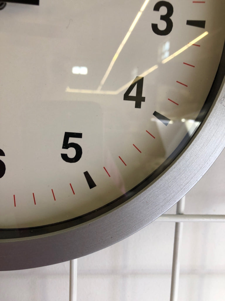 SILVER PLASTIC CLOCK.