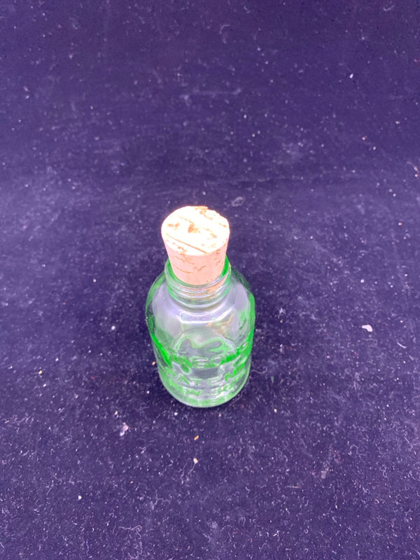 VTG GREEN GLASS GLASS BOTTLE WITH CORK TOP.