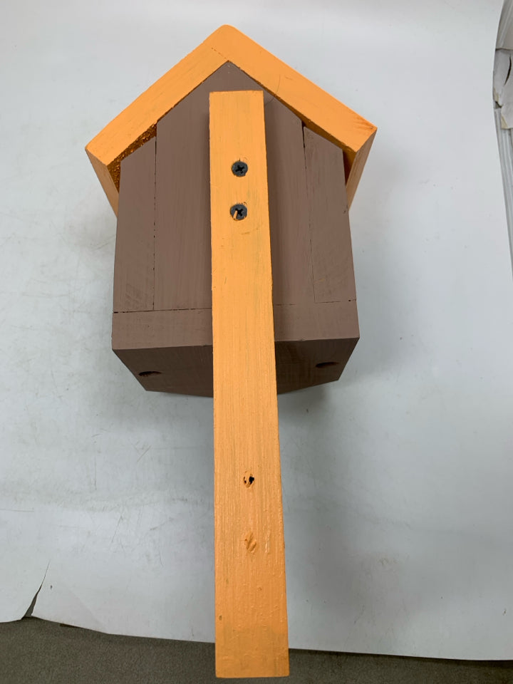 ORANGE/BROWN WOOD BIRD HOUSE.