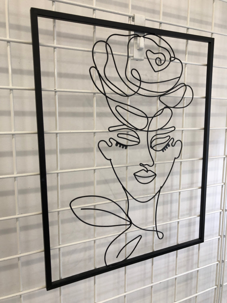 BLACK METAL LADY WITH HAT WALL ART.