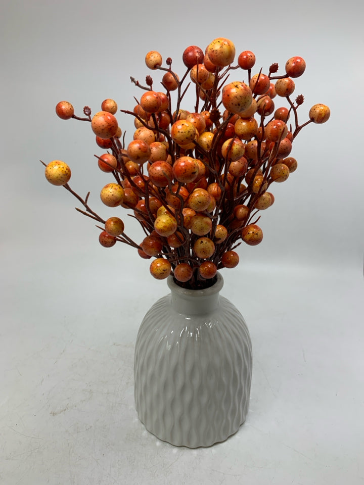 WHITE TEXTURED VASE W/ ORANGE BALLS ARRANGEMENT.